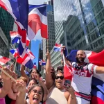 Dominicanos se han tomado la sexta Avenida para celebrar su orgullo por todo lo alto