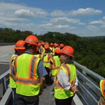 Delegación de Quisqueya participa en intercambio técnico con agencias de transporte de New York