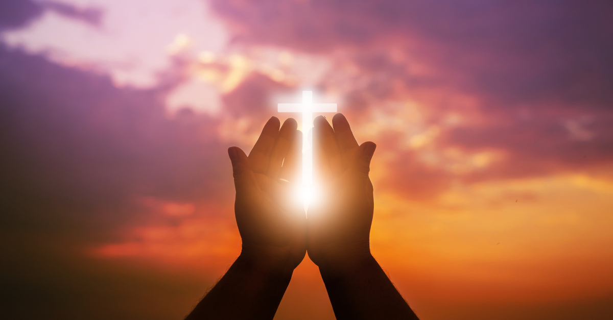 17718-light-cross-lifted-hands